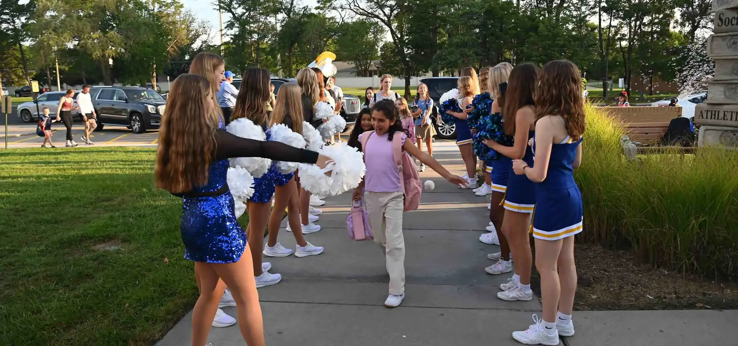 Students being welcomed to first day of school