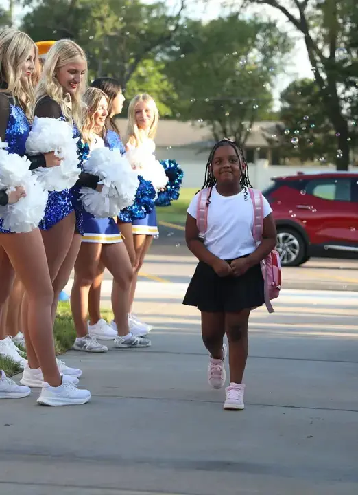 Lower school students walking from carline on the first day of school